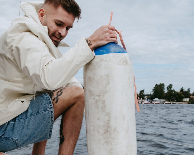 white and blue buoy